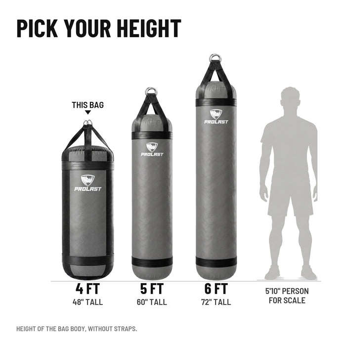 Height guide: 4, 5 and 6 ft PROLAST heavy bags in smoke grey to scale next to a 5 ft 10 in person; this bag is the 4 ft XL 150 lb