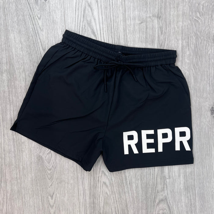 Front view of the Represent Swim Shorts in Black.