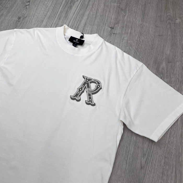 Represent 'Western Initials' T-Shirt in Flat White - Angled view.