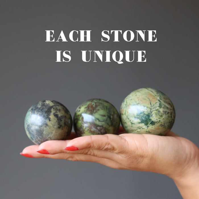 3 unique Serpentine Spheres on the palm
