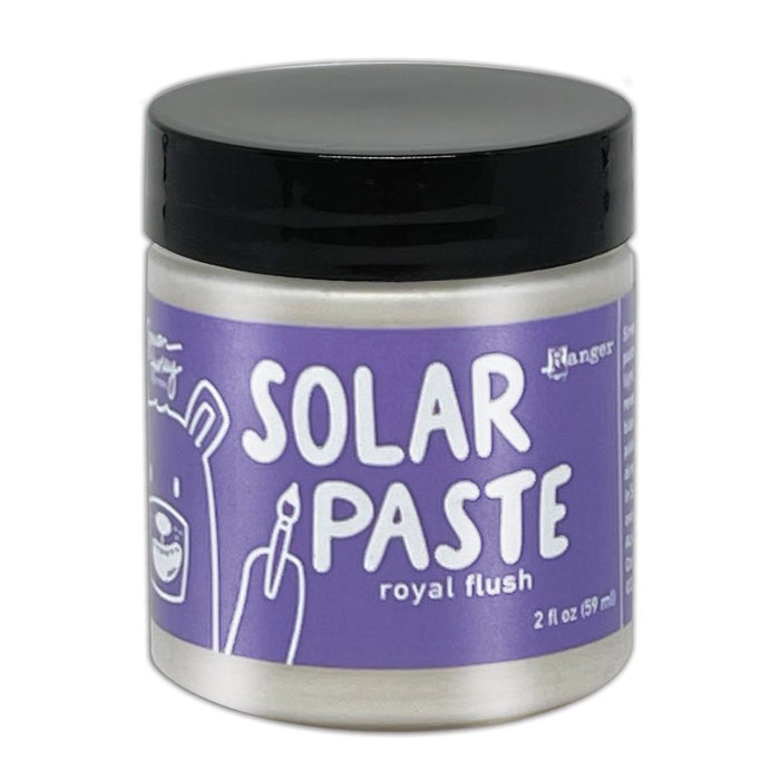 Simon Hurley  create. - Solar Paste - 2oz - Royal Flush. A creamy white paste with a metallic color shift when it hits the light. Color can be subtle on white cardstock but reveals an intense colored shine when applied to black. Available at Embellish Away located in Bowmanville Ontario Canada.