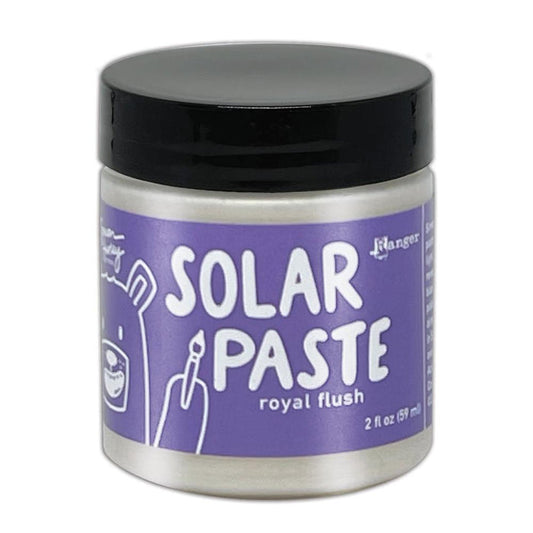 Simon Hurley  create. - Solar Paste - 2oz - Royal Flush. A creamy white paste with a metallic color shift when it hits the light. Color can be subtle on white cardstock but reveals an intense colored shine when applied to black. Available at Embellish Away located in Bowmanville Ontario Canada.