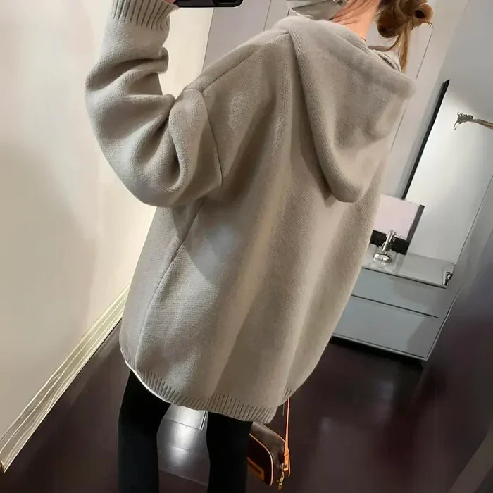 Cozy oversized hoodie with playful smiley design in khaki and black