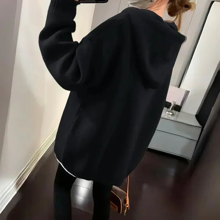 Cozy oversized hoodie with playful smiley design in khaki and black