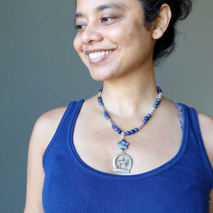 woman wearing sodalite horse necklace