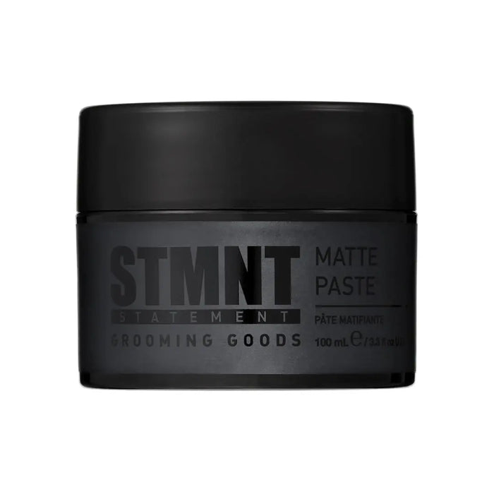“STMNT Grooming Goods Matte Paste 3.38 oz jar on white background”
