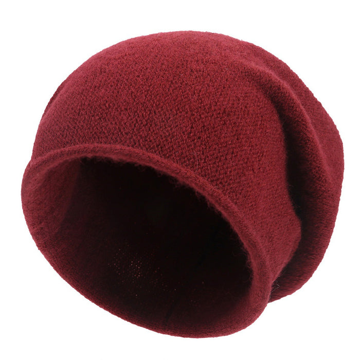 Sylvaine relaxed fit slouchy casual knit beanie shown in a soft neutral color