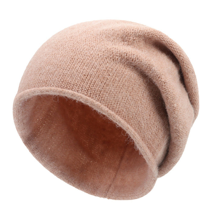 Sylvaine relaxed fit slouchy casual knit beanie shown in a soft neutral color