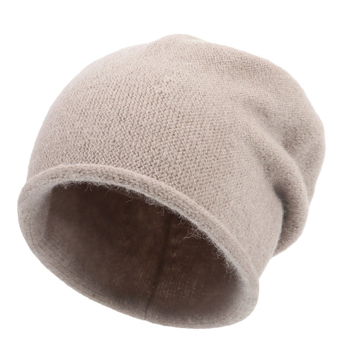 Sylvaine relaxed fit slouchy casual knit beanie shown in a soft neutral color