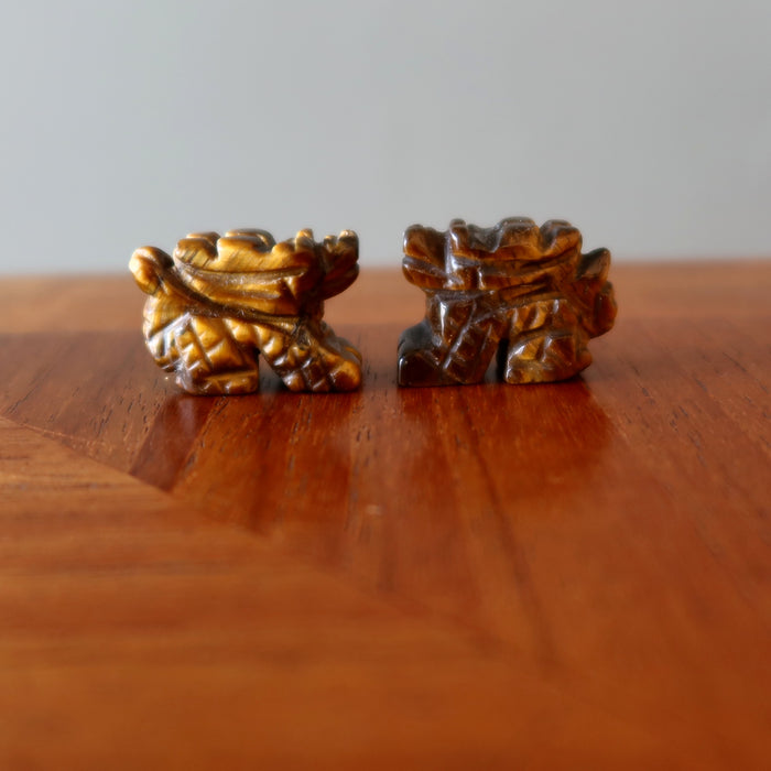 two Tigers Eye dragon statues