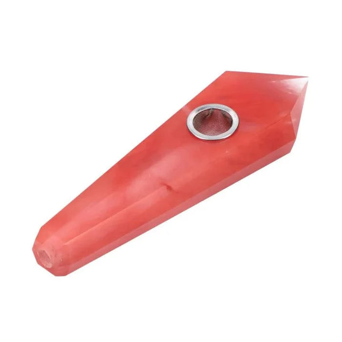 A diagonal view of the red, Melting Crystal Valiant Crystal Pipe, showcasing its crystalline form and smooth finish.