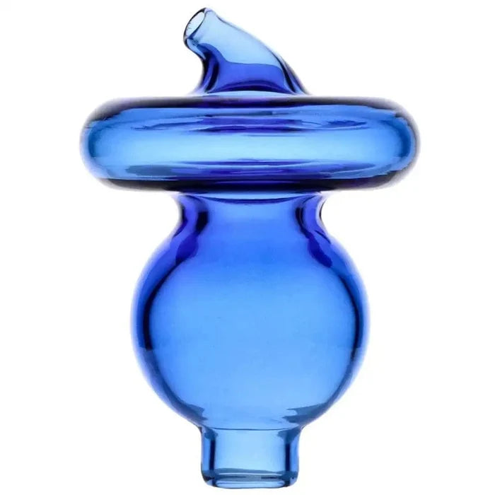 A close-up, angled view of the Valiant Glass Carb Cap - 44mm, showcasing its smooth blue glass construction.