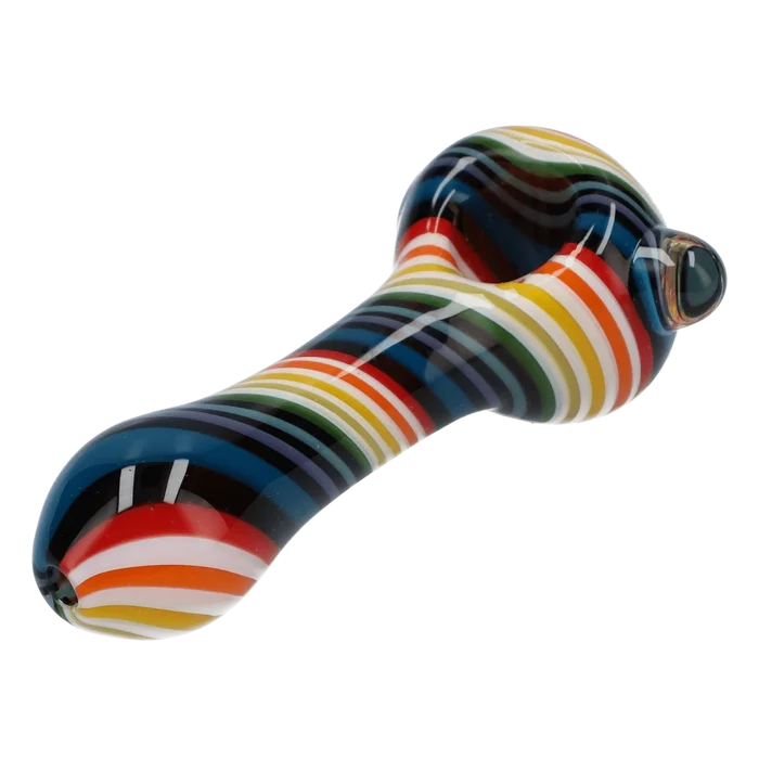 A studio shot of the 4-inch Valiant Spoon Pipe-Dark Rainbow, displaying its curved bowl and colorful, swirling glass design.
