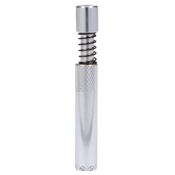 A close-up, silver Valiant Spring Loaded Half Weave Tip One Hitter, angled slightly, with a textured grip.