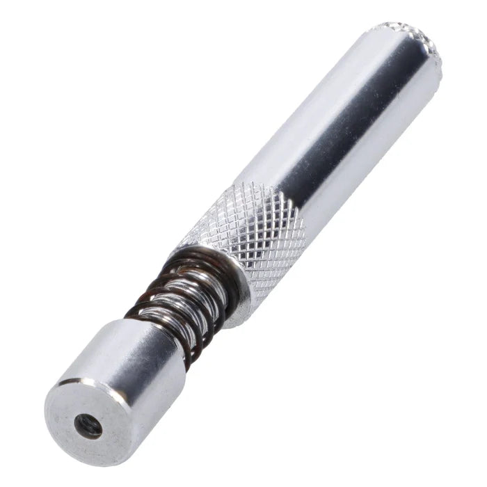 A close-up view of the silver Valiant Spring Loaded Half Weave Tip One Hitter, displaying its textured grip and spring-loaded mechanism.
