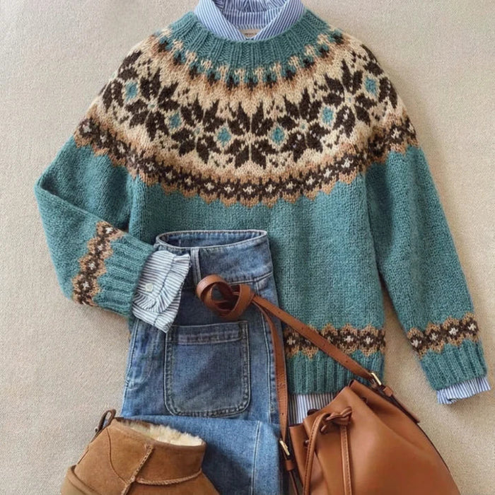 Blue vintage Nordic knit sweater with classic patterned design and relaxed fit