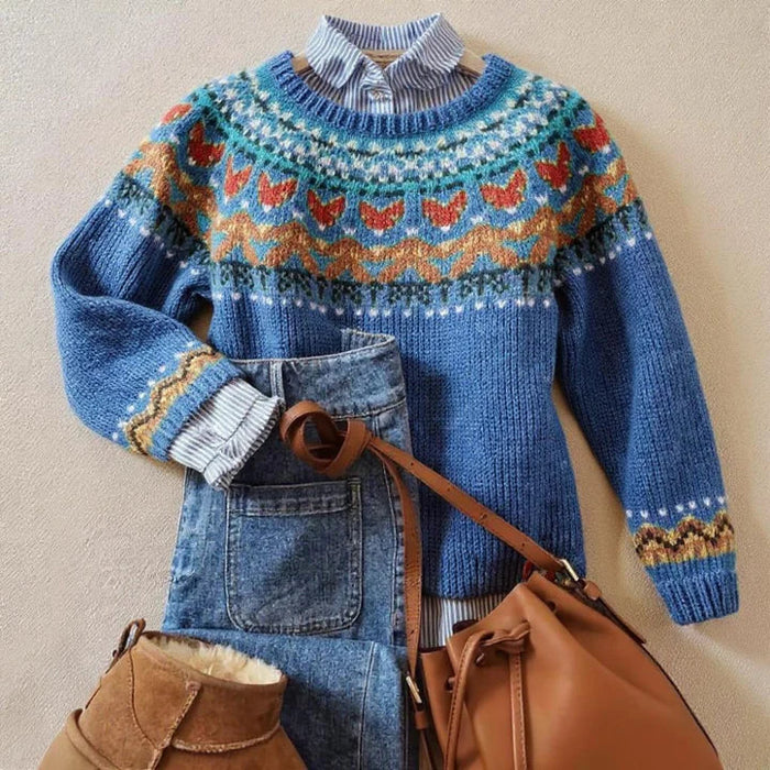 Blue vintage Nordic knit sweater with classic patterned design and relaxed fit