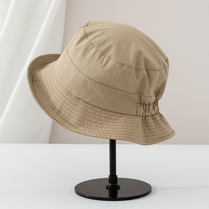 Viviane chic everyday bucket hat shown in a neutral earthy colorway