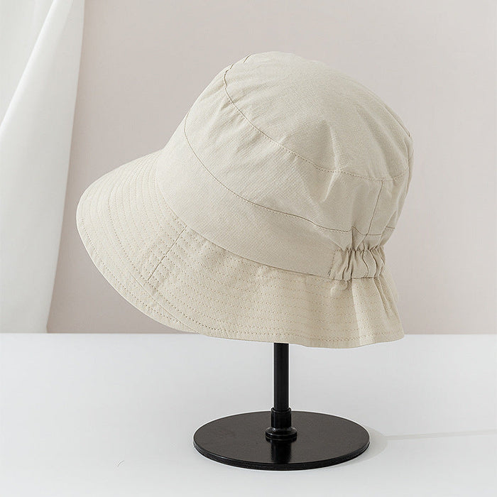 Viviane chic everyday bucket hat shown in a neutral earthy colorway