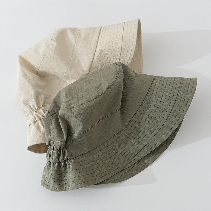 Viviane chic everyday bucket hat shown in a neutral earthy colorway