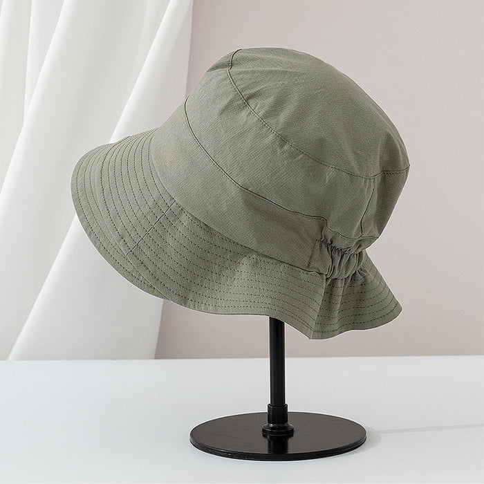 Viviane chic everyday bucket hat shown in a neutral earthy colorway