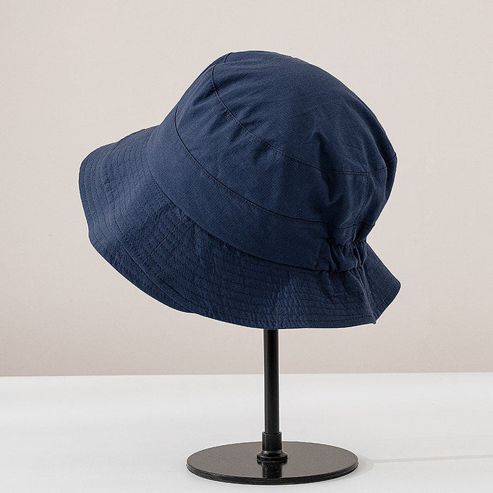 Viviane chic everyday bucket hat shown in a neutral earthy colorway