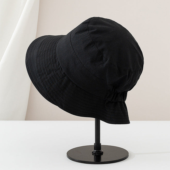 Viviane chic everyday bucket hat shown in a neutral earthy colorway