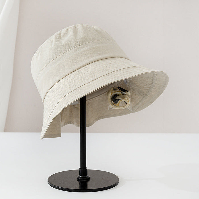 Viviane chic everyday bucket hat shown in a neutral earthy colorway