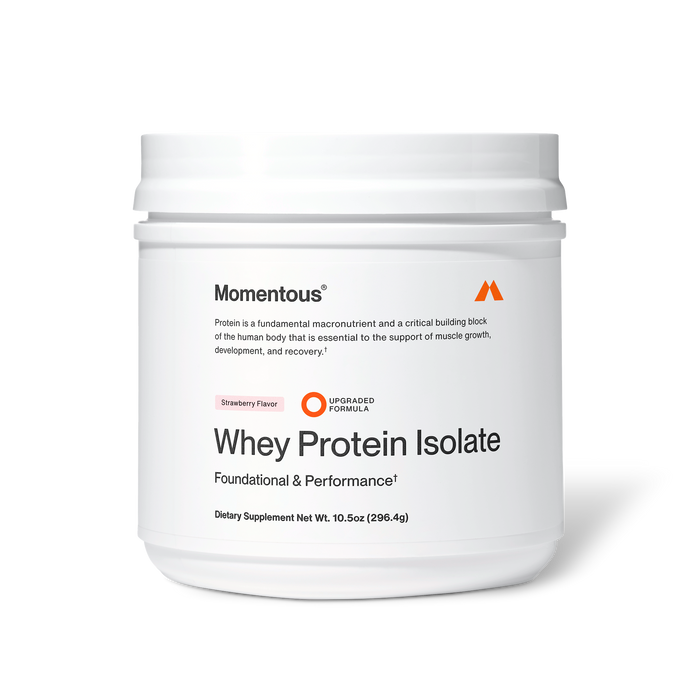 Momentous Whey Protein Isolate dietary supplement in strawberry flavor, white plastic tub, 10.5 oz (296.4 g), labeled “Foundational & Performance” with upgraded formula badge; packaging states protein is a fundamental macronutrient and critical building block essential for supporting muscle growth, development, and recovery