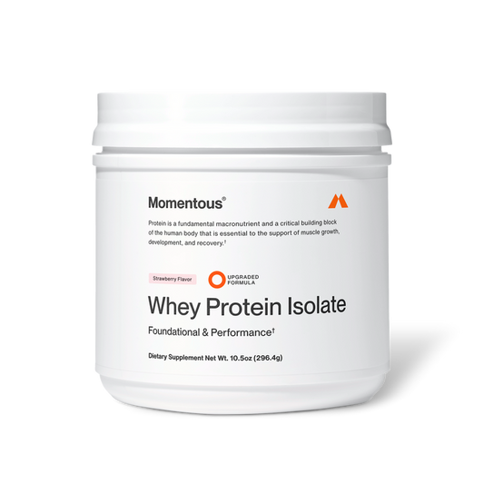 Momentous Whey Protein Isolate dietary supplement in strawberry flavor, white plastic tub, 10.5 oz (296.4 g), labeled “Foundational & Performance” with upgraded formula badge; packaging states protein is a fundamental macronutrient and critical building block essential for supporting muscle growth, development, and recovery