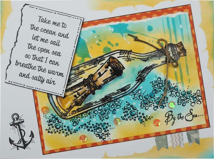 Woodware - Clear Singles - Message in a Bottle. This clear stamp set designed by Francoise Read produces a variety of nautical themed images, including a message in a bottle, a lighthouse, rope, bubbles and the sentiments "By the Sea" and "Dream". Available at Embellish Away located in Bowmanville Ontario Canada. Example by brand ambassador.