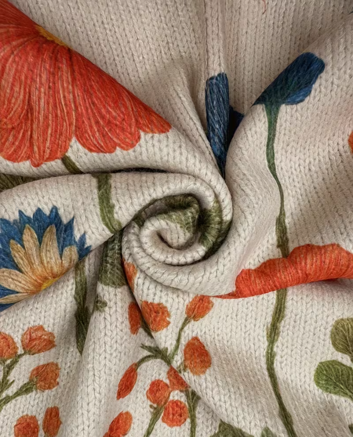 Oatmeal zip cardigan with orange poppy and blue cornflower print and gold-tone zipper