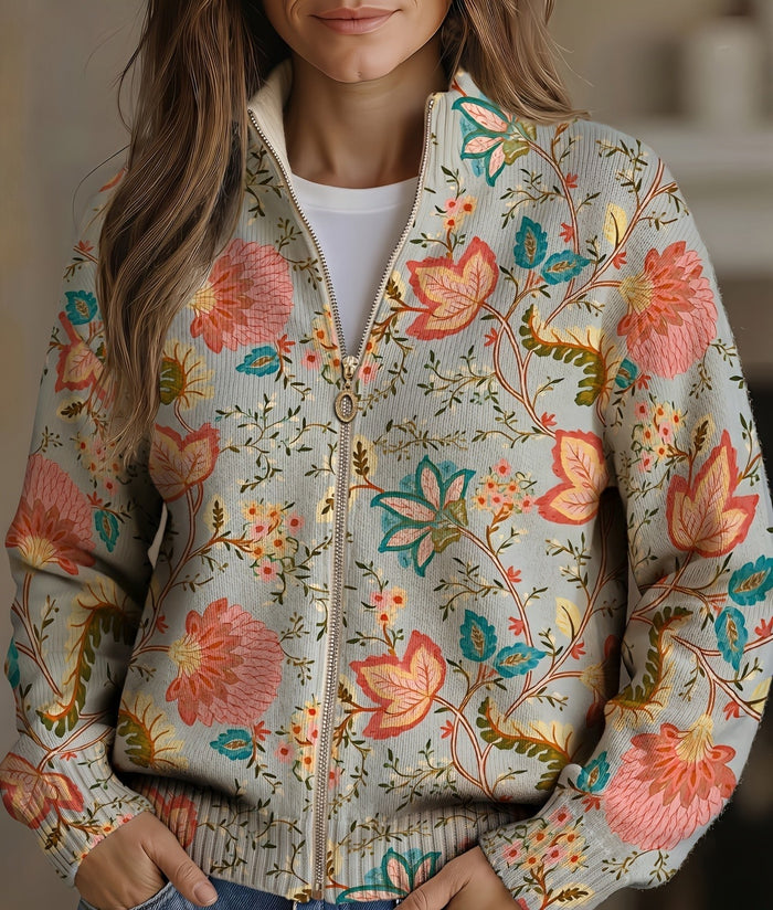 Gray floral print zip-front cardigan with gold zipper, standing collar, and ribbed cuffs