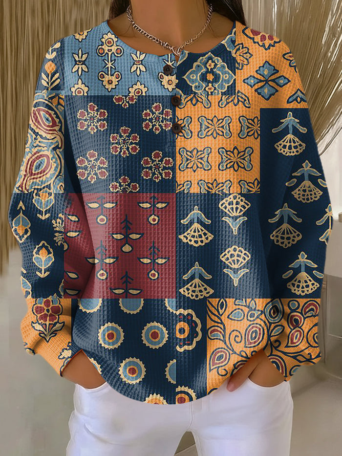 Zyravine relaxed-fit sweater with an ethnic check and floral print